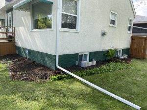 Downspout directed away from home
